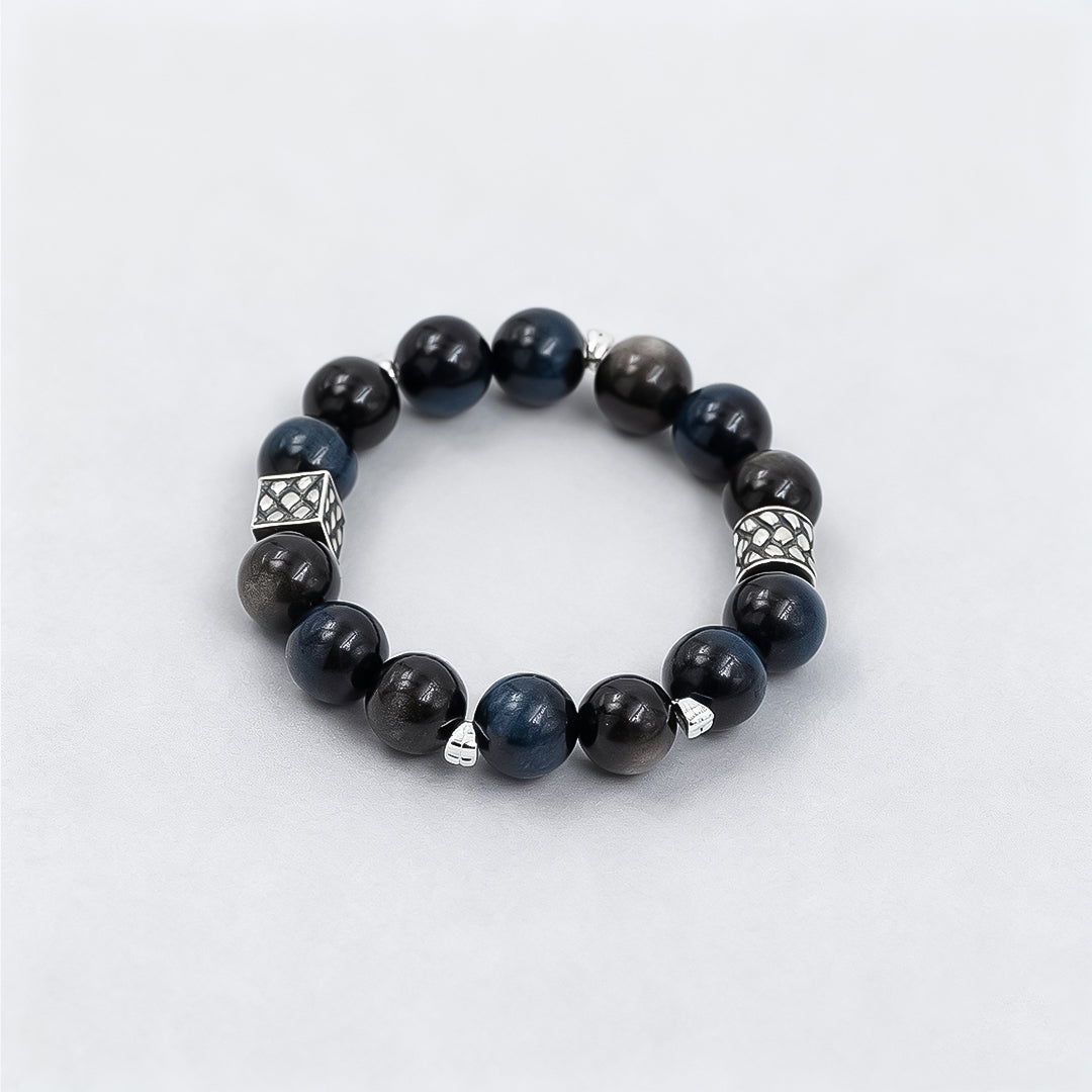 Blue Tiger Eye & Silver Obsidian · The Mystic Duality Bracelet · The Chakra Balance Awakening Chain